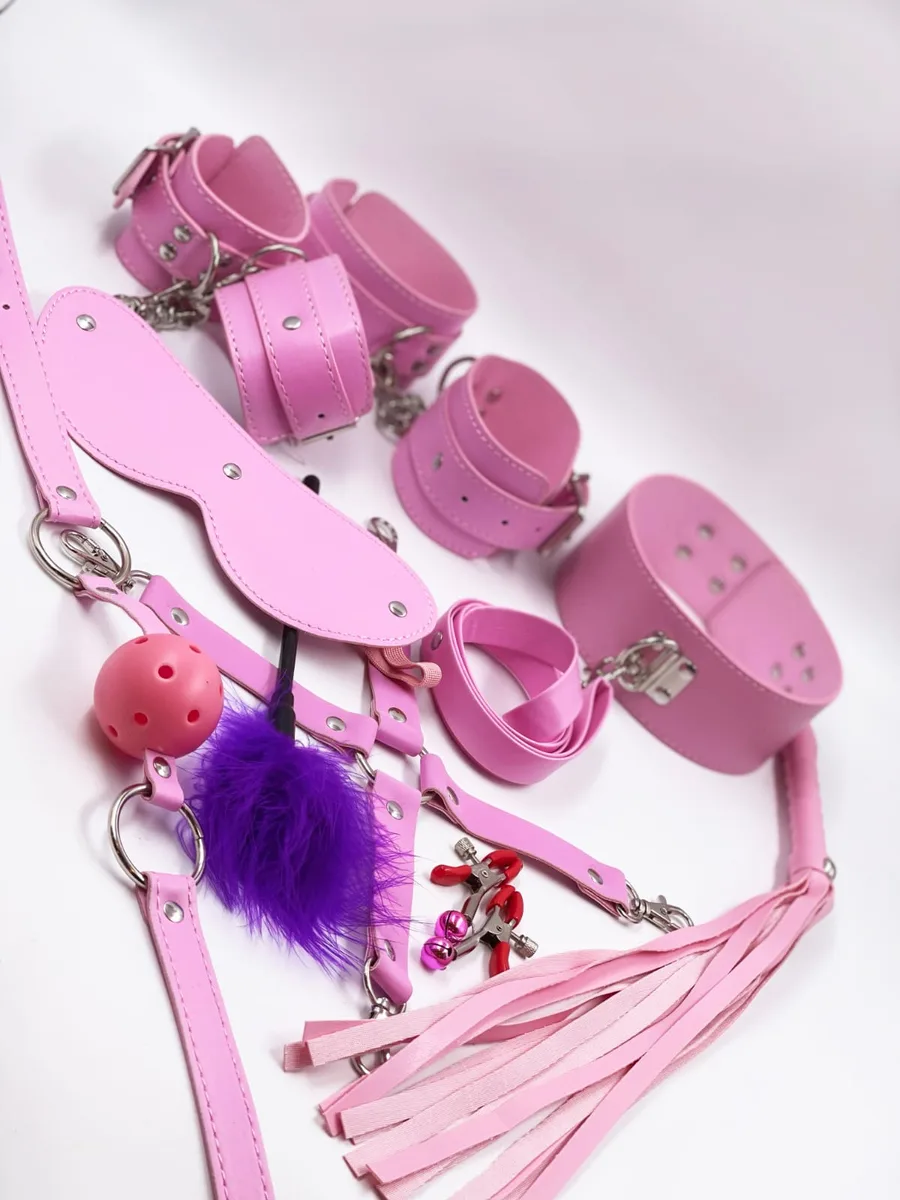Набір БДСМ рожевий (окови, пніжі, кляп, батіг, криж, затискачі, маска, гармат, нашийник, повідець) ТС-9002